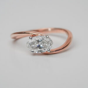 Oval Solitaire Engagement Ring with Twisted Rose Gold Band