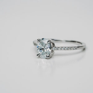 Engagement Ring with Oval Solitaire in White Gold with Tiger Prong Setting