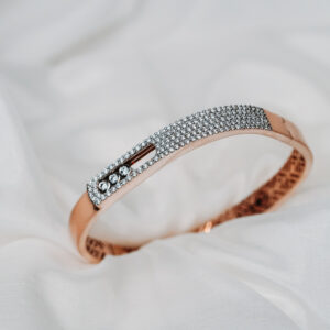 Rose Gold Diamond Micro Pave Bangle with Three-Stone Dancing Accents